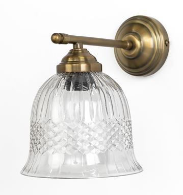 גוף תאורה מעוצב עם כיסוי זכוכית שקופה, מתאים לתאורה לסלון או לחדרים אחרים.